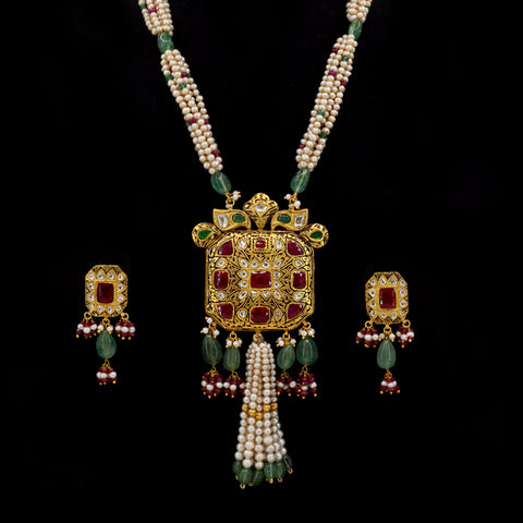 Traditional Syndicate Polki and Ruby Gold Pendant Set with Pearl Strings